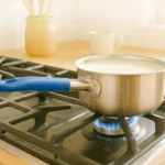 KMW 28 CM Stainless Steel Sauce Pan with Vinyl Handle & Capsule Bottom - Image 4